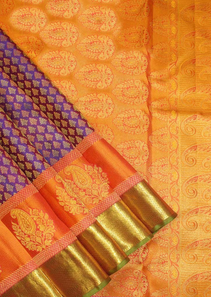 This Orange Pally with Purple coloured Body with Floral motifs are of Pure silk and Zari - Bridal collection