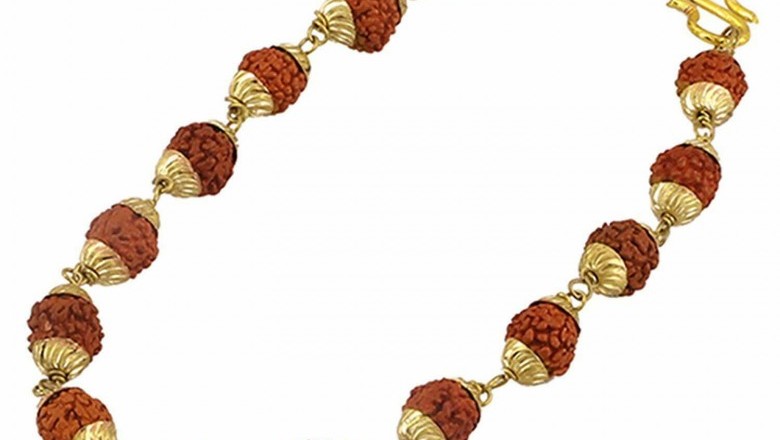 Handmade Bracelet of Rudraksha Bead in golden brass Caps