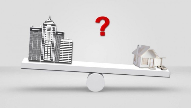 What are the advantages of living in a flat as compared to an independent house?