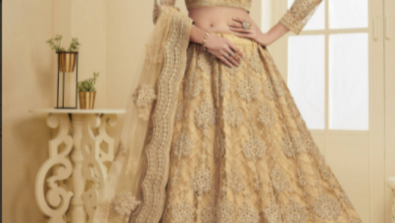 Buy Golden Coding Embroidery Net Bridal Wear Lehenga Choli Online from EthnicPlus for 9,349.00