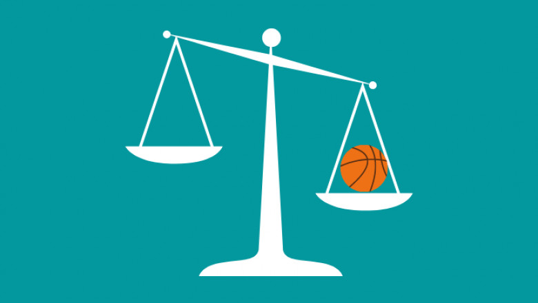 How a weighted basketball can help in scoring a three-pointer?