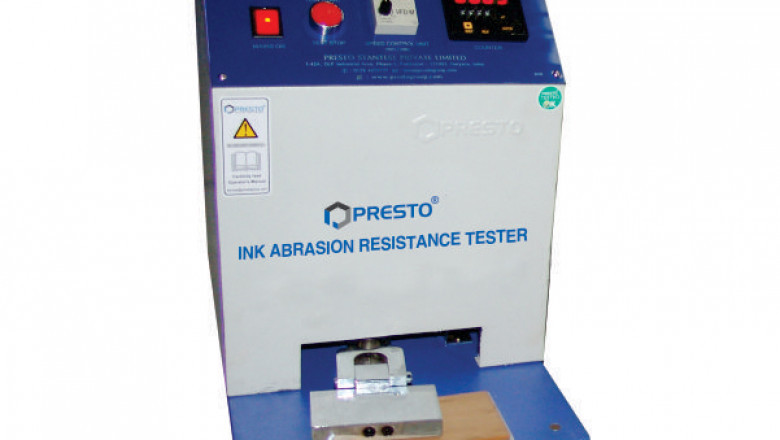 What is an ink abrasion resistance tester, and how does it work?