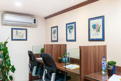 What are the benefits of using a shared office space?