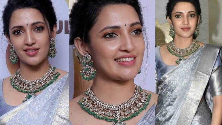 Neha Shetty looks stunning in a sky-blue silk saree at a shop opening